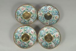 A GOOD SET OF FOUR RUSSIAN SILVER AND ENAMEL SAUCERS. 11.5cm diameter. Mark: Head, 84, A.C. over