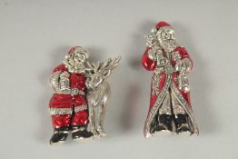 TWO SILVER AND ENAMEL SANTA CLAUS BROOCHES (2).
