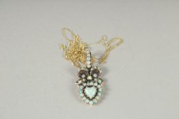 A 9CT GOLD BOW PENDANT on gold chain.