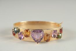 A GOOD GOLD BRACELET set with large precious stones. 37gms.