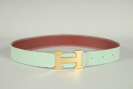 A HERMES LEATHER BELT. 35ins long.
