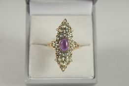 A 9CT GOLD AMETHYST PERIDOT AND PEARL SUFFRAGETTE'S COLOURS RING.