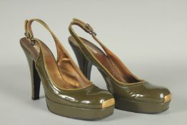 A PAIR OF MIU MIU BROWN SHOES Size UK 37.