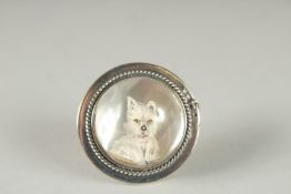 A SILVER REVERSE ESSEX CRYSTAL CIRCULAR TERRIER BROOCH.