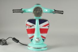 A GREEN UNION JACK VESPA LAMP. 13ins high.