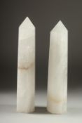 A PAIR OF ROCK CRYSTAL OBELISKS. 12ins high.