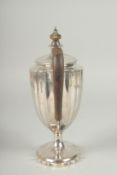 A GEORGE III SILVER COFFEE POT of tapering fluted form with wooden handle and final. London 1798.