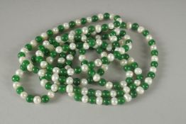 A STRING OF JADE AND PEARLS. 48ins long.