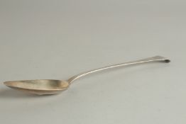 A GEORGE III SILVER LONG HANDLED GRAVY SPOON. London 1809. Maker: T. D.