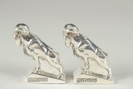 A PAIR OF DECO STYLE RAMS, SALT AND PEPPERS. 5ins high.