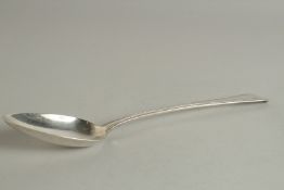 A GEORGE III SILVER BEAD EDGE GRAVY SPOON. London 1819.