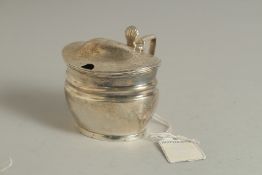 A GEORGE III SILVER MUSTARD POT AND COVER with sapphire blue liner. London 1805. Maker: W. I.I.