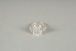 A GOOD SILVER C Z RING.