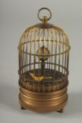 A BIRD CAGE CLOCK. 5.5ins high.