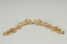 A GOOD PAIR OF 18CT GOLD DIAMOND SET LALOUNIS DROP EARRINGS in original box.