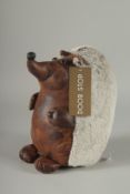 A SOFT ANIMAL DOOR STOP, HEDGEHOG.