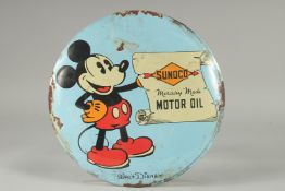 AN ENAMEL MICKEY MOUSE CIRCULAR SIGN.