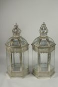 A PAIR OF CROWN TOP HEXAGONAL COPPER LANTERNS. 25ins high.