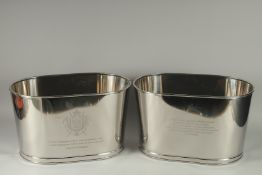 A PAIR OF BOLLINGER WINE COOLERS. 10ins x 17ins.
