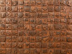 Ron Hitchens (1926-2019), an untitled composition of 108 terracotta tiles, signed, 17.5