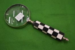 A magnifying glass.