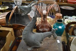 A cast metal model of a dragon, an Eastern hardwood box and an inlaid tray.