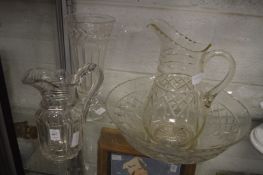 A good cut glass jug, a vase and a cut glass jug and bowl set.