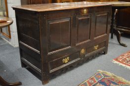 An 18th century oak marriage chest.