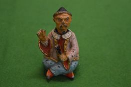 Small painted model of a nodding Chinaman.