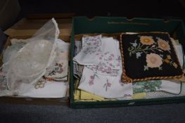 A quantity of linen, textiles, place mats, tablecloths etc.