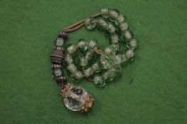 A set of colourful worry beads.