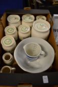 A collection of Kleen kitchen storage jars and other items.