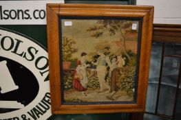 A wool work picture in maple frame.