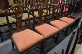 Four mahogany dining chairs.