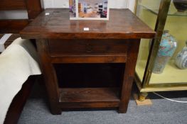 A pair of hardwood two-tier single drawer bedside tables.