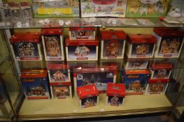 A large quantity of Lemax Village Collection houses, landscapes, figures etc.