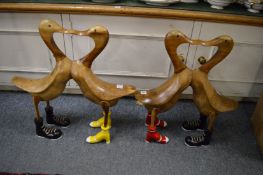 A pair of novelty carved wood ducks.