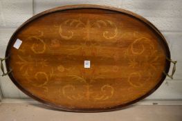 An Edwardian inlaid mahogany twin handled tray.