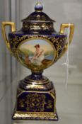 A small Vienna porcelain pedestal vase and cover.