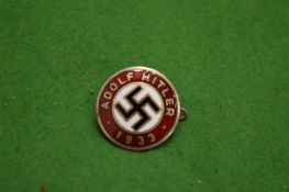 A German military enamel badge dated 1933.