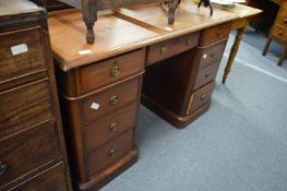 A Victorian mahogany twin pedestal desk.
