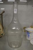 A Continental large glass carafe.
