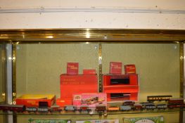 A quantity of Hornby and Triang 00 gauge carriages etc, some boxed.