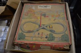 A 'Piccadilly' tin plate clockwork car and track set with original box.