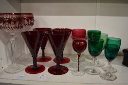 Cranberry and other glassware.