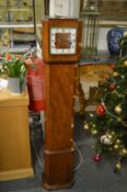 A 1940's walnut grandmother clock.