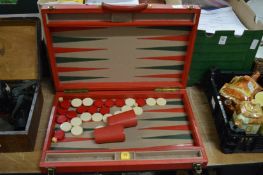 A back gammon case with contents.