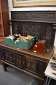 A Jacobean revival carved oak sideboard/buffet.