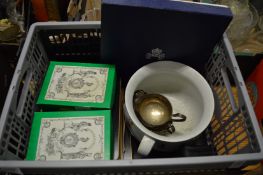 Place mats, plated sauce boat and other items.