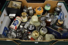 A collection of novelty lighters and other items.